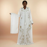 White peacock embroidered boubou kaftan with matching shawl, worn by a model
