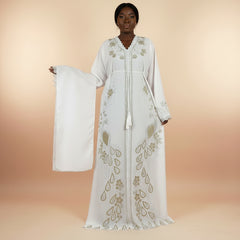 White peacock embroidered boubou kaftan with matching shawl, worn by a model