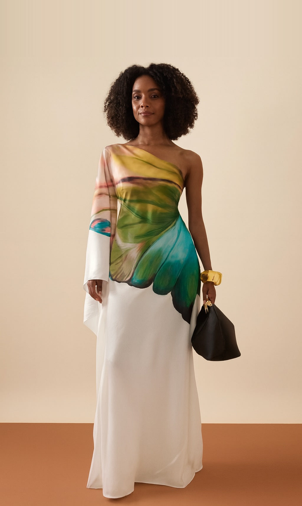 Woman wearing one-shoulder floral print maxi dress, African-inspired occasionwear, ARINZE