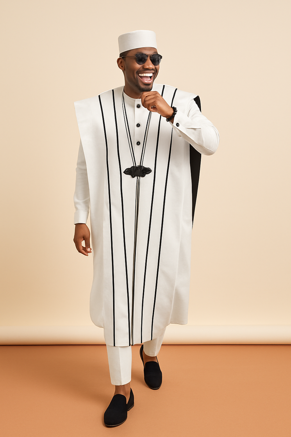 Agbada 3-Piece - White, worn by a model on a cream and clay studio backdrop